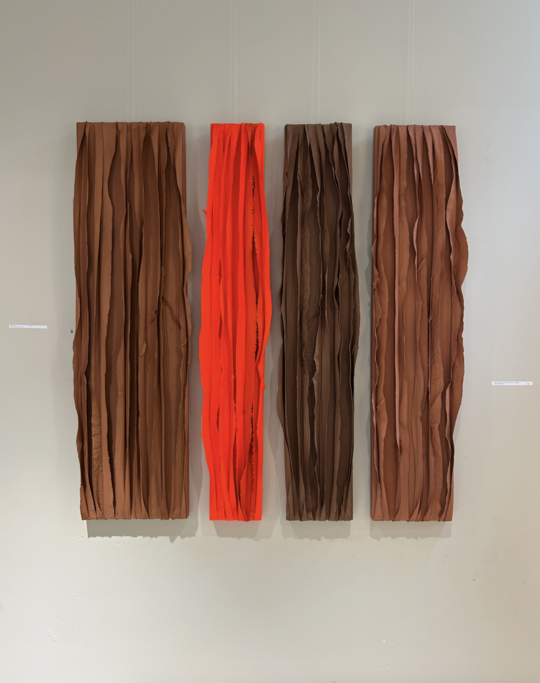 Mixed fabrics with acrylic browns and bright red